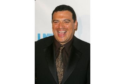 Comedian Carlos Mencia pleads not guilty to 12 felony charges of failure to pay taxes
