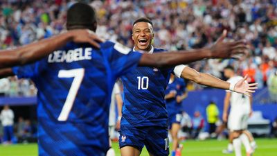 Mbappé's double on 100th appearance fires France into World Cup knockout stages