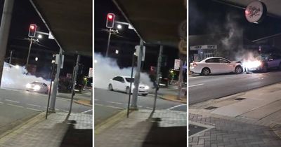 Police in pursuit of driver involved in running a red light, head-on crash