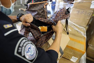 Surprising counterfeit pattern in millions of US purchases across 24,000 ZIP codes, because both rich and poor bought more fake luxury goods than the middle class, and the motive may be status, not just price