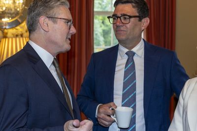 Starmer and Burnham hold talks as prime minister promises ‘smooth transition’ of power after resignation