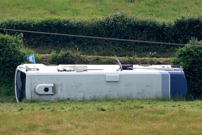 19 injured after bus crash at roundabout in Wales