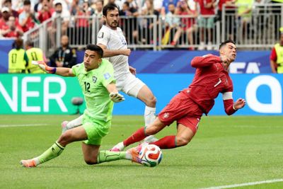 Record-breaker Ronaldo guides Portugal to 5-0 win over Uzbekistan