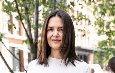 Katie Holmes elevates straight-leg jeans with Chanel's iconic toe-cap pumps – I've found £23 flats with the same feel for less.