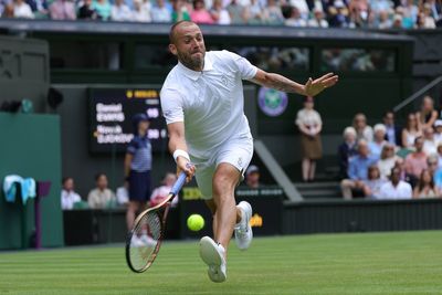 Dan Evans’ singles career ends with defeat in Wimbledon qualifying after power outage halted play