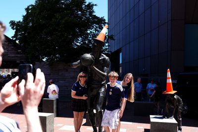 Why Scotland fans are putting traffic cones on statues at the World Cup