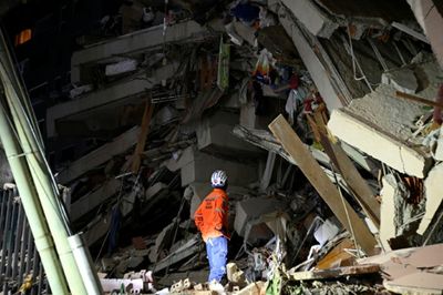 Mothers search, men weep amid debris of Venezuela quakes