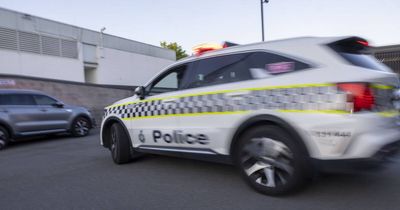 Wanted man allegedly runs red light, crashes into car in bid to evade police