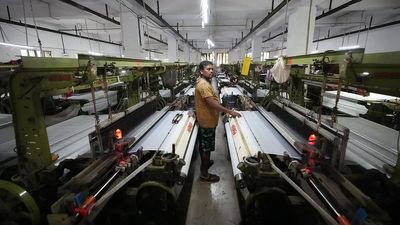 How one Indian textile worker copes with extreme heat in factory work and cramped living quarters