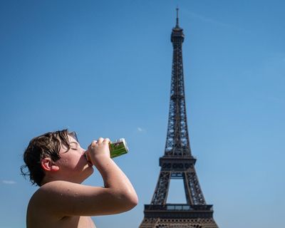 Extreme heat grips Europe as UK hits new June record, France shuts down nuclear reactors and deaths rise across continent – as it happened