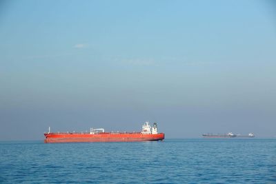 Oil prices retreat back to pre-war levels as vital shipping route reopens