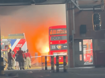 Moment London bus bursts into flames in Westbourne Park during record heatwave