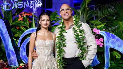Moana star walks home-town blue carpet with 'The Rock'