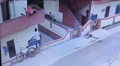 Watch video: Man injured after falling from balcony while reaching for ice cream