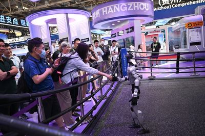 We must tax robots to protect humans from AI taking their jobs, employment expert James Reed says