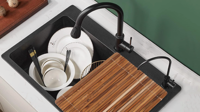 This Foldable Teak Drying Rack Saves Space, Hides Dishes, Adds Counterspace, and Doubles as a Colander — And It's On Sale