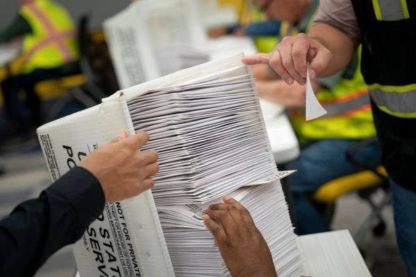 US judge blocks Trump administration’s bid to restrict mail-in voting