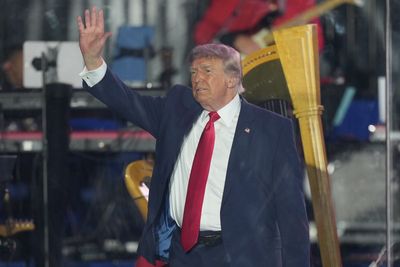 The Latest: Supreme Court lets Trump administration end legal protections for Haitians and Syrians