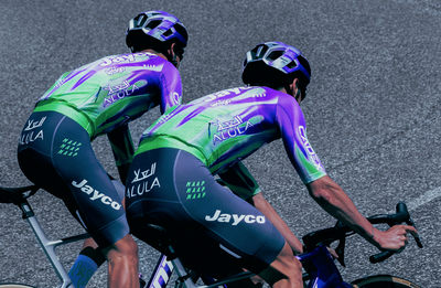 'Unexpected' pop of 'electric' green with purple flames featured in swap-out kits for Jayco AlUla for men's and women's Tour de France