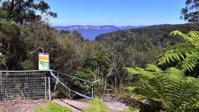 Mother's body found in bushland after murder charge