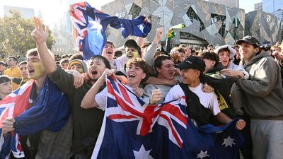 Fans kick on after teen arrested at Socceroos live site