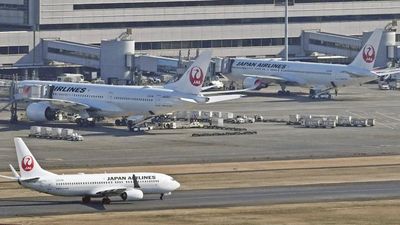 Japan braces for twin tropical storms, airlines cancel over 100 flights