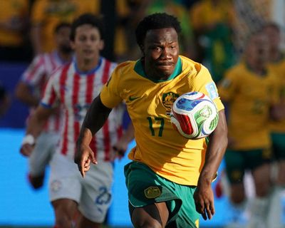 Socceroos secure place in World Cup last 32 after nerve-shredding draw with Paraguay