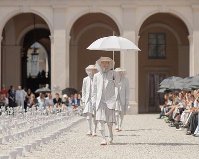 Behold the sunbrella, fashion’s stealth accessory for a heatwave