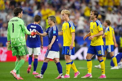Japan and Sweden secure World Cup knockout places after 1-1 draw