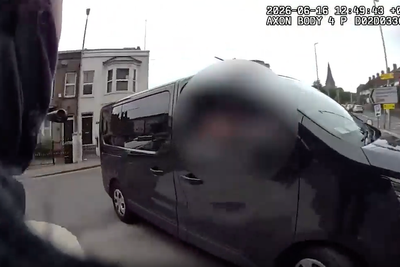 Armed police officer hitches lift with van driver to chase down suspect