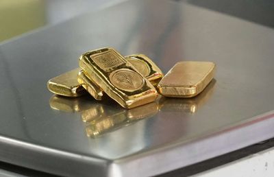 Gold heads for fourth weekly loss amid Fed rate hike expectations