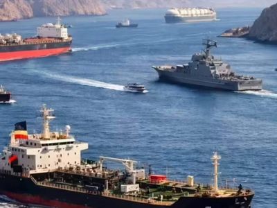 Hormuz traffic eases, ships continue using disputed Oman route