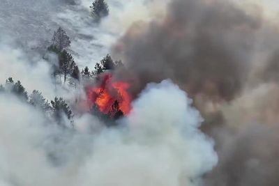 Wildfire scorches Peak District as helicopters tackle huge blaze in heatwave