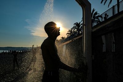 Records tumble as European heatwave moves east