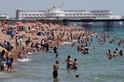 Britain’s record heatwave ends with thunderstorms and travel chaos