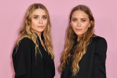 Mary-Kate and Ashley Olsen make a rare public appearance at family wedding