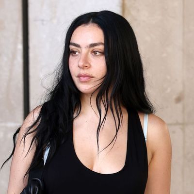 Charli XCX Adds a Pop of Color to Her Gucci Little Black Dress With Barbie Pink Crocodile Pumps