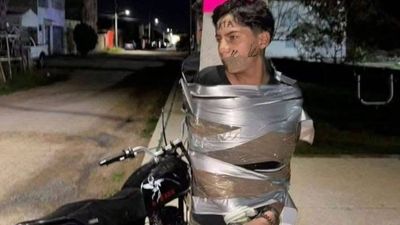 The dark knight of Jalisco: Mexico's 'Batman' hunts motorcycle thieves, leaves them taped to lampposts