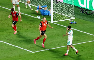 Austria draw with Algeria in World Cup thriller to progress and send Iran home