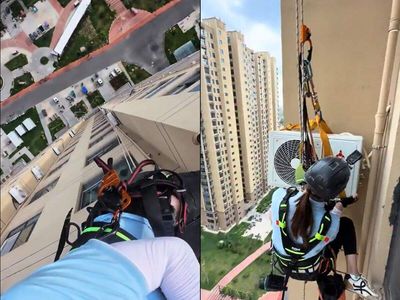 As Europe faces extreme heat, China's 'Spider-Woman' AC installer stuns the internet