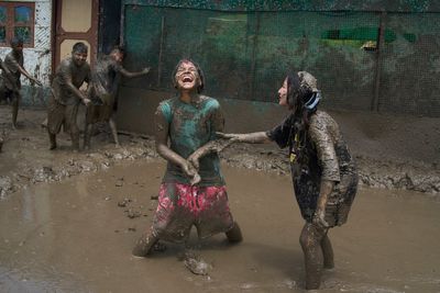 Photo show Paddy Day, the festival marking the start of the rice planting season in Nepal