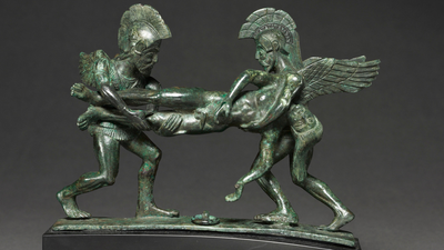 Sleep and Death cista handle: A 2,400-year-old sculpture depicting gods carrying away Zeus' son during the Trojan War