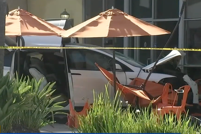Tesla crashes into cafe killing 79-year-old woman and injuring five others