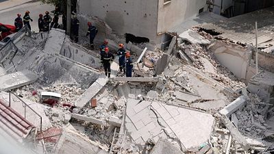 At least four trapped after apartment block collapses in Athens, fire brigade says