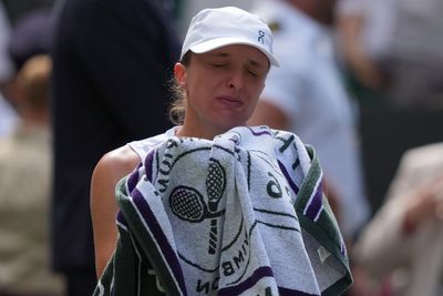 Iga Swiatek overcome with emotion after tense Wimbledon win over Taylor Townsend