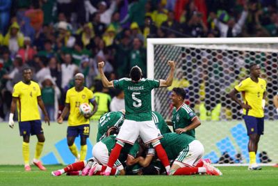 Mexico beat Ecuador 2-0 to reach World Cup last 16 and end knockout hoodoo