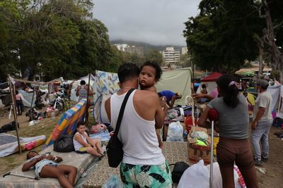 Furious Venezuelans hit out at claims of military looting during search efforts