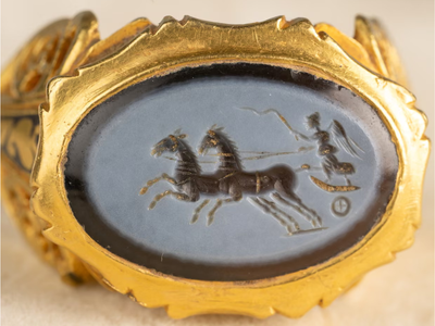 A man searching a field in England found a 1,700-year-old Roman gold ring so rare that it later sold for £78,000
