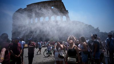 Water cannons cool tourists at Rome's Colosseum amid heatwave