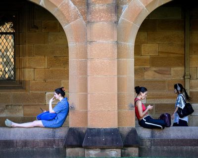 Arts degrees to cost $50,000 until at least 2028 as measures to lower Australian university fees put on hold